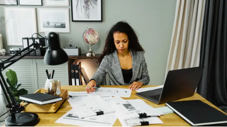 Real estate investor reviewing appraisal and funding documents